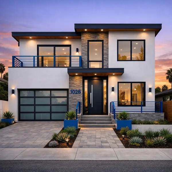 Modern newly built single family home exterior in Los Angeles featuring new construction details and subtle blue accents.